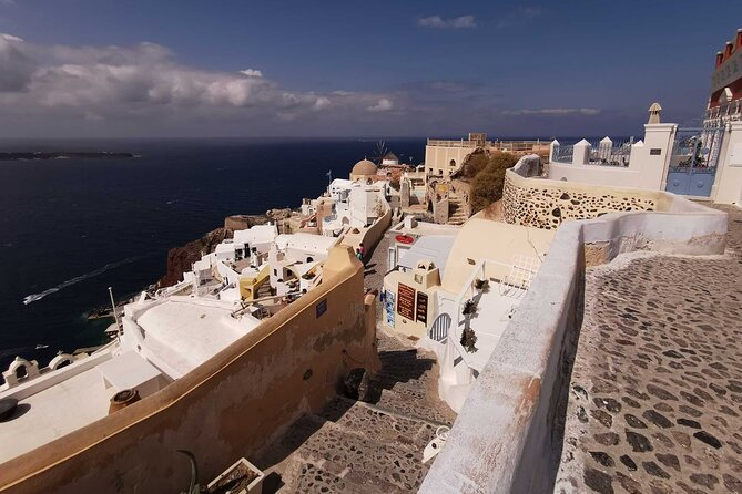 Authentic Santorini: A Self-Guided Audio Tour of Oia - Oia castle, cave houses, and the big viewpoint payoff