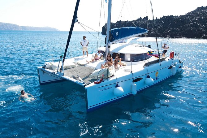 Best of Santorini Private Half-Day Catamaran Cruise with transfer and meal - Red Beach and White Beach: Volcanic Color, Real Swim Time