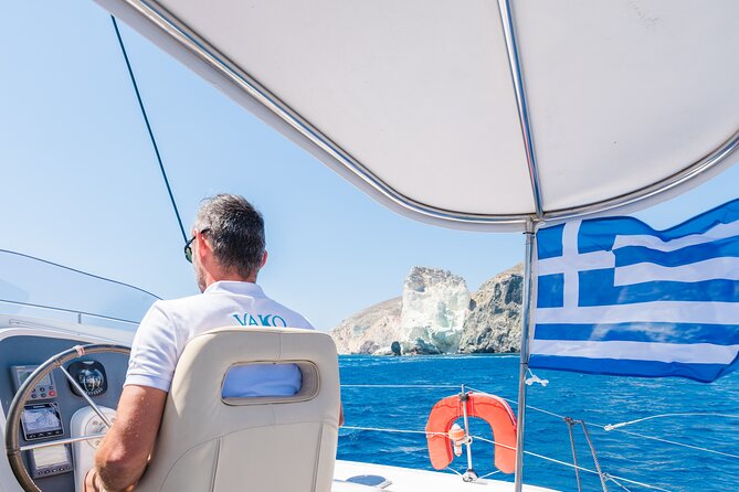 Best of Santorini Private Half-Day Catamaran Cruise with transfer and meal - Sailing Past the Old Lighthouse and Black Rock Photos