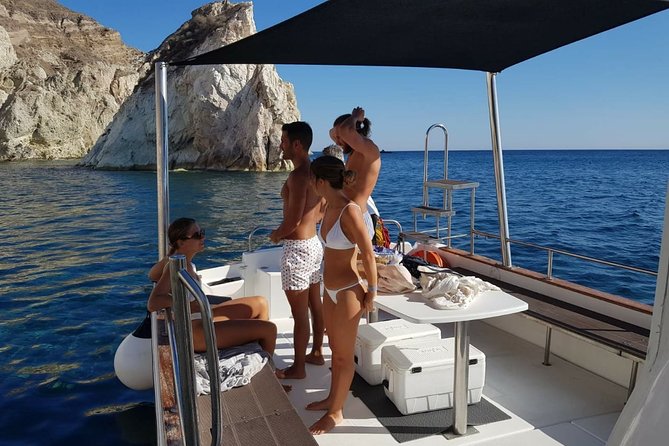 Caldera Private Cruise & Volcano Hike - Stop 1: Santorini Volcano hike, volcanic coast snorkeling, and shade on board