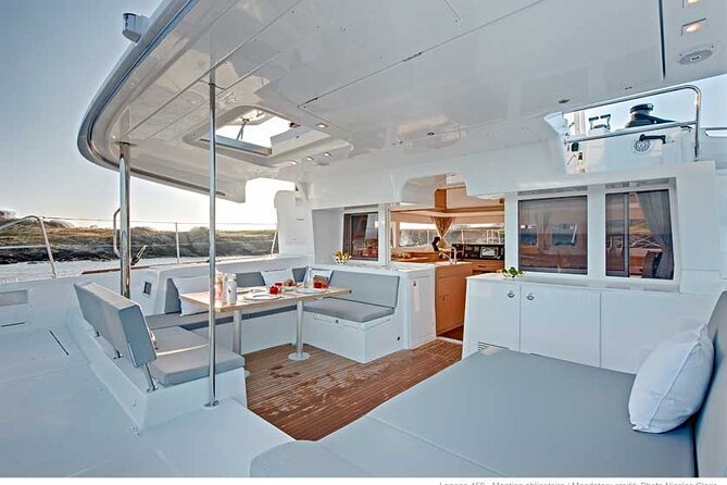 Deluxe Santorini Sailing with BBQ and Drinks Shared Tour - Stop 1: Red Beach, quick but unforgettable color