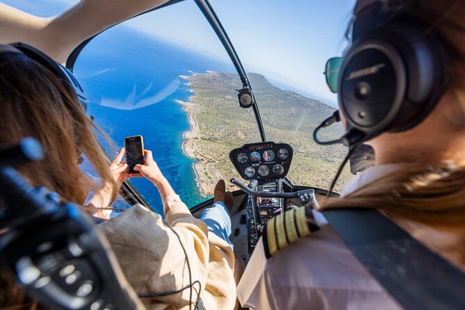 Experience Santorini Sunset by Helicopter - Palea and Nea Kameni volcano: dark craters from above