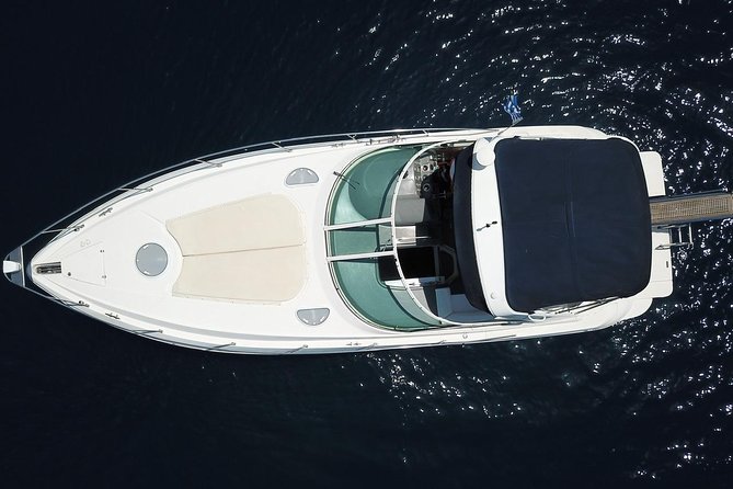 Explore Santorini’s volcano with Alex Private Boat Rental - Nea Kameni hot springs: warm water, mineral feel, and the sulfur swimsuit rule