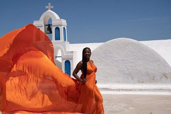 Flying Dress Photoshoot in Oia Private entry to Blue Dome - Key things you’ll notice right away