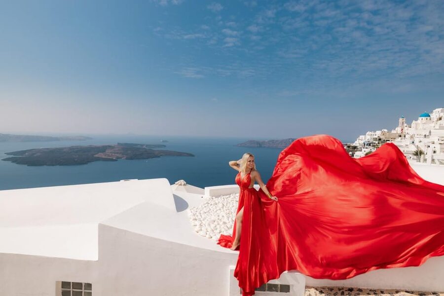 Flying dress Photoshoot in Santorini with Hotel Pickup - Real people doing real work: photographer, assistants, and calm direction