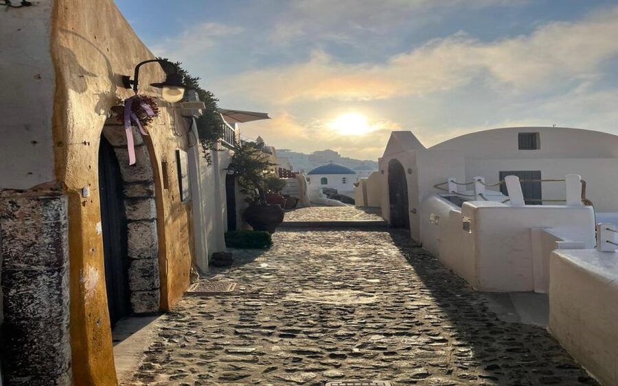 From Santorini: Guided Oia Morning Tour with Breakfast - The Three Bells of Fira: a quick stop with a clear purpose