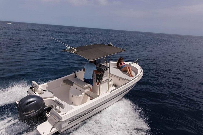 Full Day Boat Rental with License in Santorini - What the boat includes: shower, USB, cooler, and navigation help