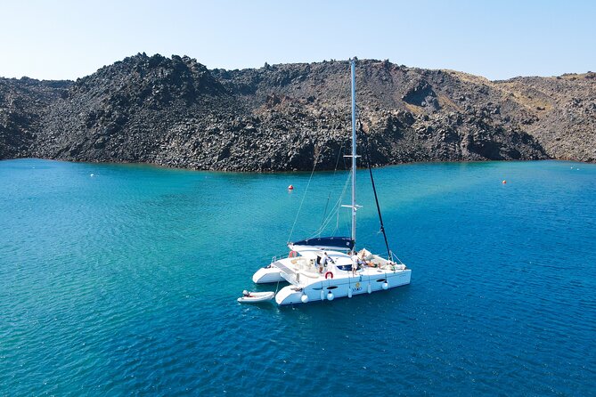 Full Day Santorini Catamaran Private Cruise with meal and transfer - Palia Kameni and Nea Kameni: hot springs time in the caldera