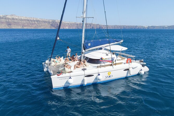 Full Day Santorini Catamaran Private Cruise with meal and transfer - Getting to the boat: Vlichada start time and pickup reality