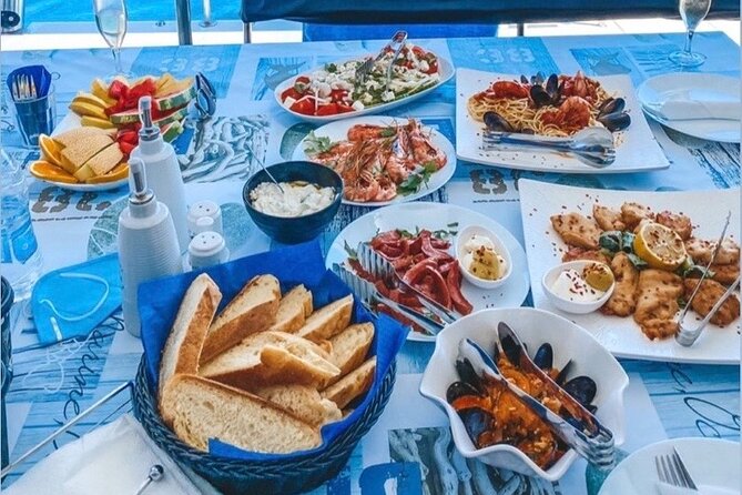 Half-Day Exclusive Catamaran Cruise in Santorini with Meal and Open Bar - Price and Value: Is $133.02 Worth It for What You Get?