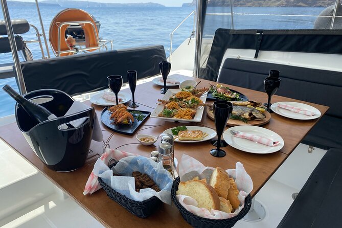 Half Day Premium Catamaran Cruise in Santorini including Oia - Warm service, BBQ dinner, and an open bar that keeps things flowing