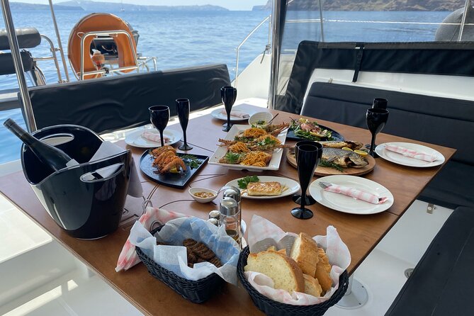 Half-Day Tailor-made Private Catamaran Cruise in Santorini - Onboard food and the crew vibe: where the reviews keep agreeing
