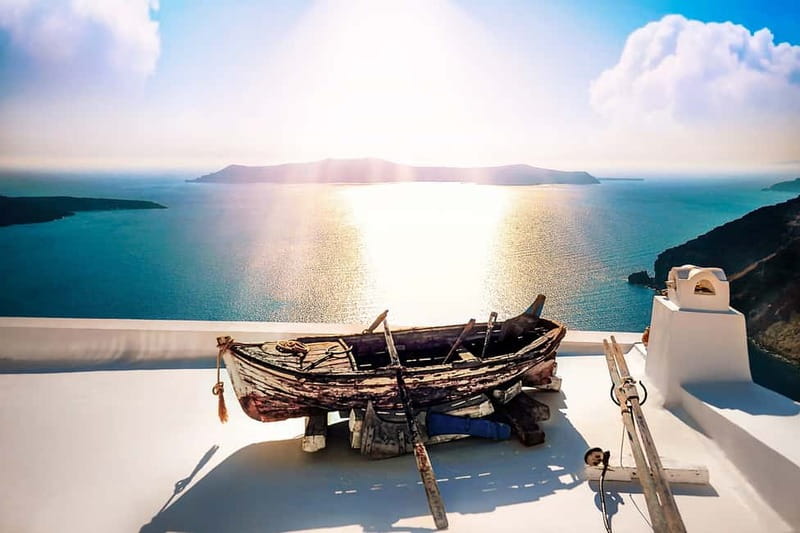 Heraklion: Guided Santorini Day Trip with Ferry Cruise - Fira town: guided orientation plus independent wandering on the cliff