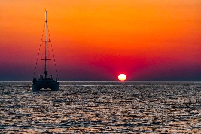 Luxury Small-Group Catamaran Cruise with BBQ, Open bar & Transfer - Why this catamaran day feels different from a typical Santorini tour