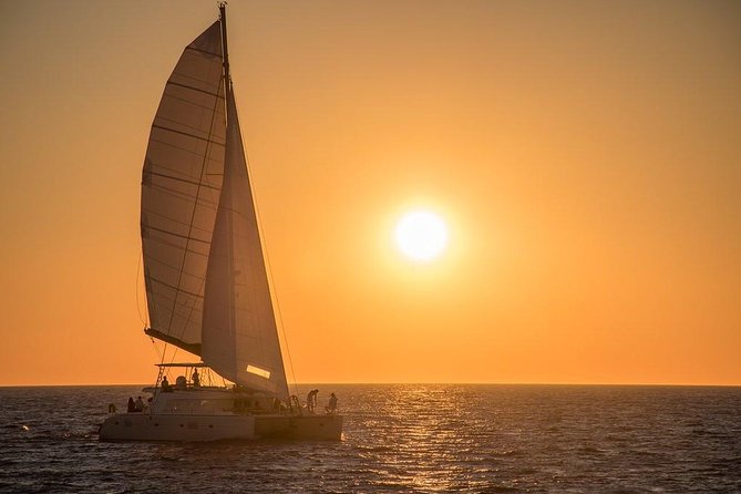 Luxury Small-Group Catamaran Cruise with BBQ, Open bar & Transfer - Palea Kameni Hot Springs: warm water, real swim, and boat traffic