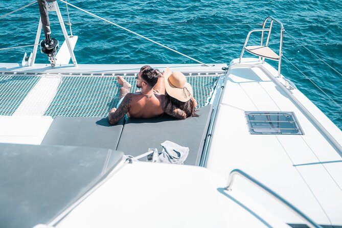 Majestic Catamaran Caldera Cruise with Snacks, Meal & Drinks - On-board comfort: Wi-Fi, towels, and the small-boat vibe