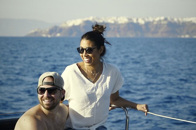 Private Luxury Santorini Catamaran Cruise with Port Pickup - Nea Kameni and the onboard Greek meal with caldera views