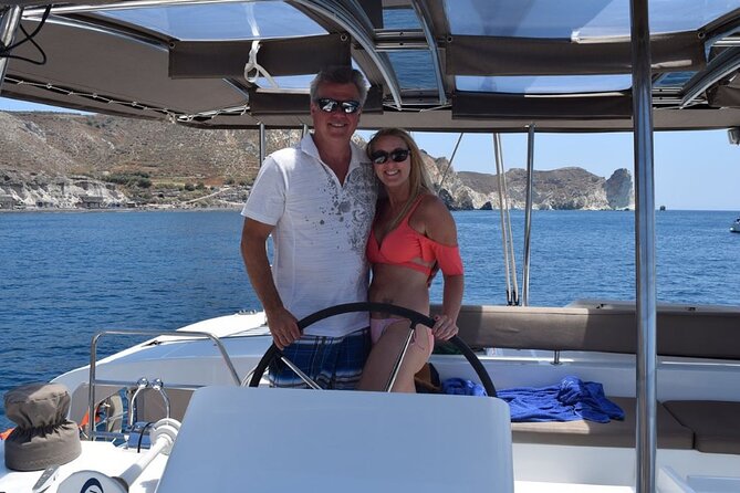 Private Luxury Santorini Catamaran Cruise with Port Pickup - Drinks onboard: included wine and beer with a safety limit