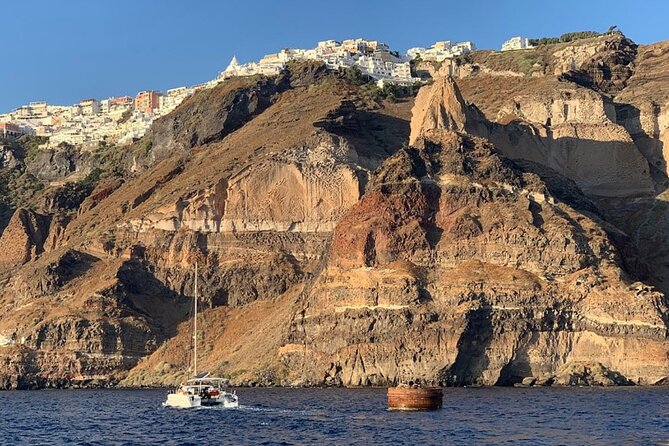 Private Luxury Santorini Catamaran Cruise with Port Pickup - Daytime versus sunset: pick the mood, not just the time