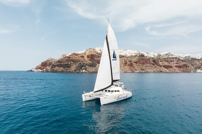 Private Morning Tour Lagoon 400-380 Sailing in Santorini ,lunch, drink, transfer - From Your Hotel To Amoudi, Then Out Onto the Caldera