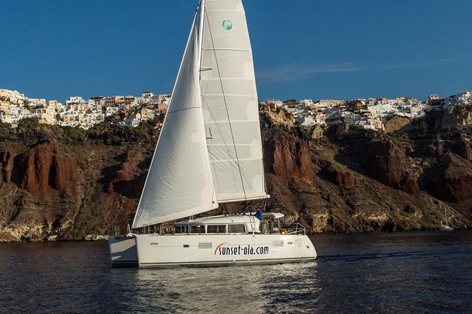Private Morning Tour Lagoon 400-380 Sailing in Santorini ,lunch, drink, transfer - The Catamaran Route: Views of Nea Kameni, Old Lighthouse, and the Black Mountain