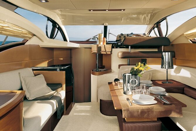 Private Motor Yacht Cruise with BBQ, Open Bar & Transfers - Nea Kameni and Thirassia: more swimming, more coastline variety