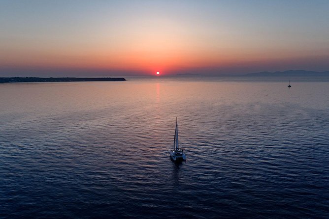 Private Sunset Cruise with Dinner and Drinks! - Sailing to the Santorini Volcano, hot springs, and volcanic islands