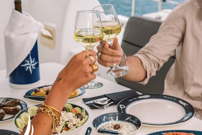 Private Sunset Cruise with Full Greek Dinner - Palia Kammeni Hot Springs: The Swim Stop That Makes the Cruise Memorable