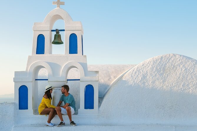 Professional Photoshoot at Oia Village Santorini - Where the photos happen in Oia: church fronts, blue domes, and cliffside viewpoints