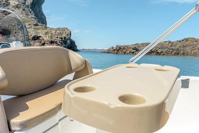 Rent a Boat in Santorini with Free License - A realistic “5-hour” day on the water, from Caldera cruising to swim time