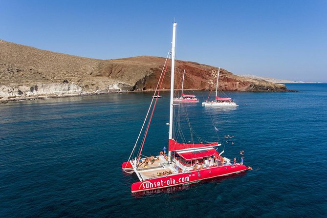 Sailing Catamaran Cruise in Santorini with BBQ, Drinks and Transfer - A Santorini Caldera Catamaran With BBQ and Drinks