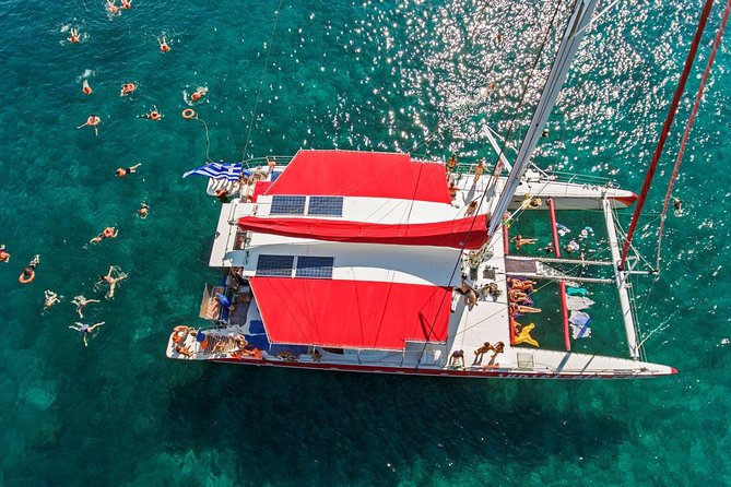 Sailing Catamaran Cruise in Santorini with BBQ, Drinks and Transfer - Sailing Past the Volcano and Watching Landmarks From the Sea