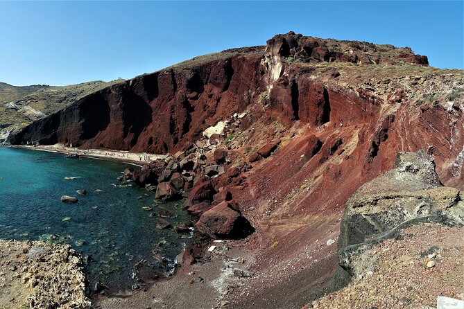 Sailsational Luxury Santorini Catamaran Sunset Cruise with Dinner - Stop 2: White Beach, pumice and ash tones (20 minutes)