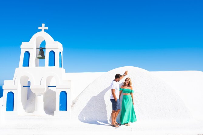 Santorini 2h Photoshoot with a photographer & transportation - Stop 2: Three Bells of Fira, caldera views with a more open feel