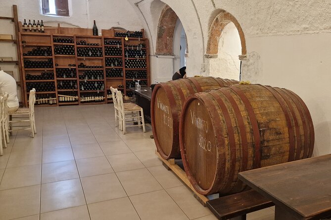 Santorini: 4hrs Small Group Wine Tasting Tour with Local Bites - Wine tasting and local bites: what you actually get