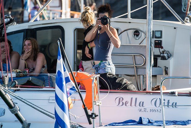 Santorini Adventurous Catamaran Experience with Snorkeling - Daytime versus sunset cruises: choose based on your mood