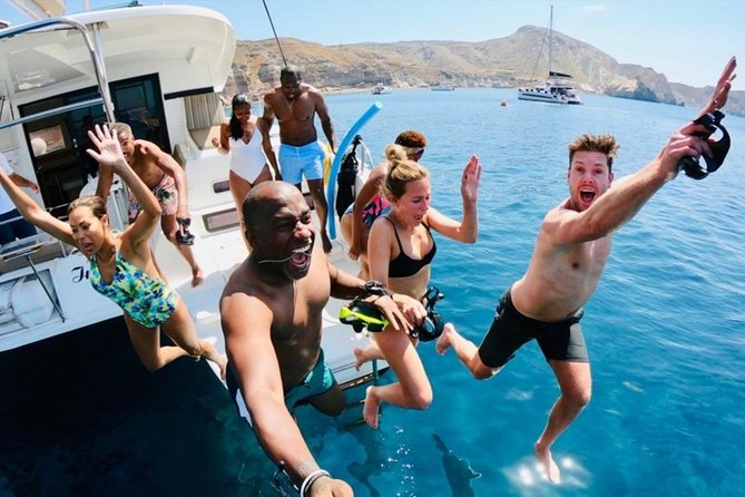 Santorini All-inclusive Catamaran Cruise with Thirassia Stop - Volcano sailing: Palea Kameni vs the hot springs on Nea Kameni