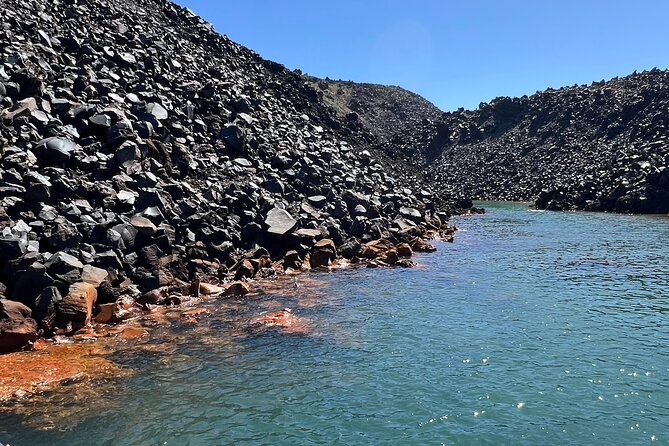 Santorini: Boat tour to Volcano, Hot Springs & Thirasia island - On-board comfort perks: noodles, towels, wine, and sea conditions