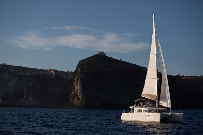 Santorini Caldera Gold Day Cruise with BBQ on board and Open Bar - Nea Kameni hot springs: the volcanic swim that makes the whole cruise worth it