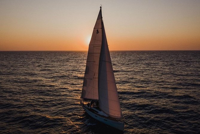 Santorini Caldera Private Sailing Boat Cruise - Crew and how they manage the water time