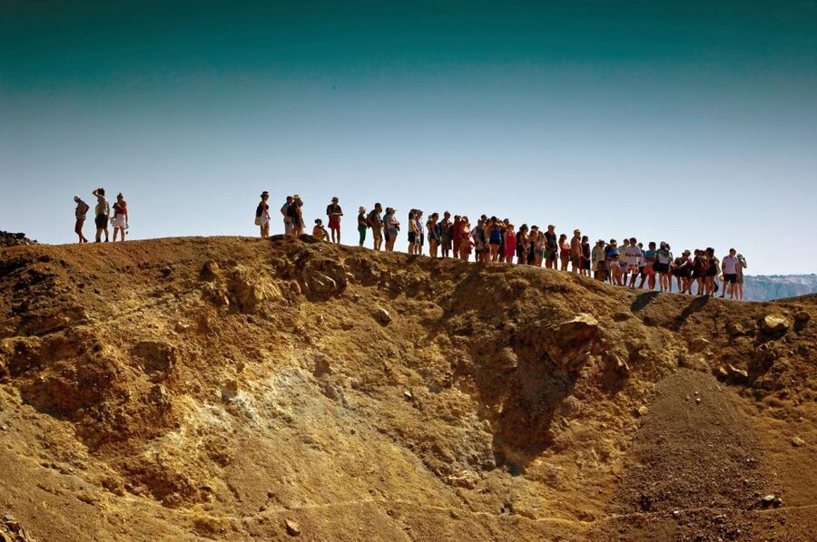 Santorini Caldera: Sunset Cruise with Dinner - Back under Oia: cliff views before you change scenes on land