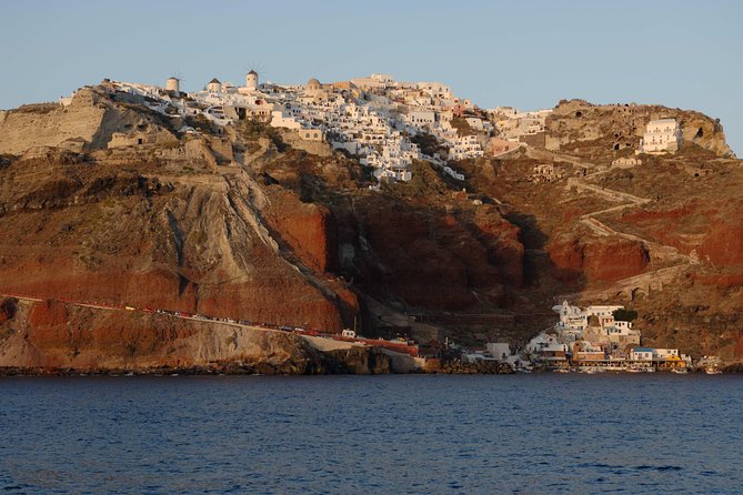 Santorini Caldera Sunset Sailing Cruise with Dinner and Wine - Stop 2: Palea Kameni hot springs swim, confident swimmers only