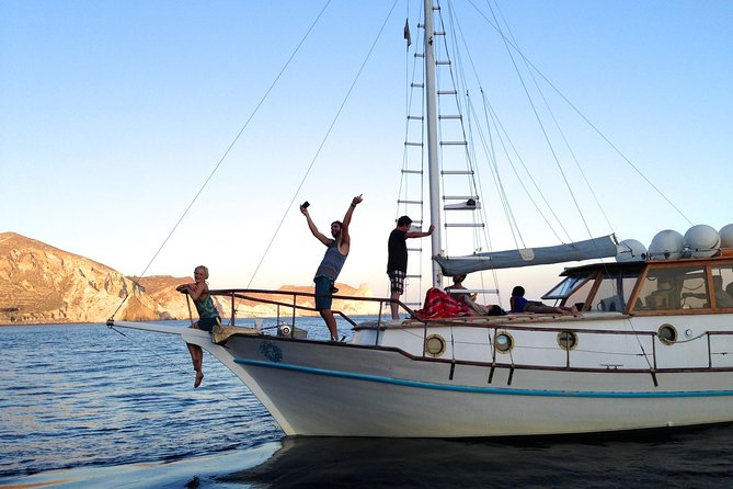 Santorini Caldera Sunset Traditional Cruise with Meal and Drinks - Ammoudi Bay to Vlychada, the tone of the trip
