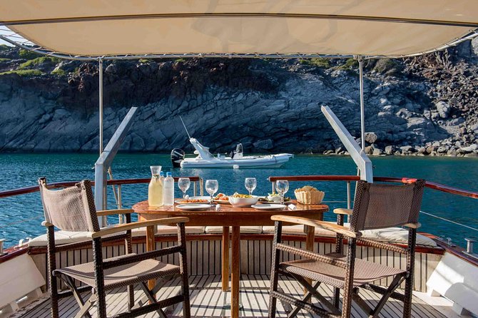 Santorini Caldera Sunset Traditional Cruise with Meal and Drinks - The small-group advantage, plus what it means for your comfort