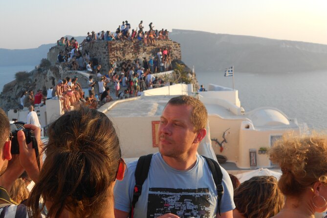 Santorini car tour with a local - Perivolos Beach: black volcanic sand and a fun wind-down