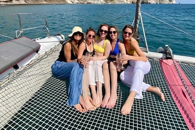 Santorini Catamaran Cruise – 5-Hour Private Sailing Experience - Red Beach Swim Stop: Photos, Snorkeling, and Real Water Time