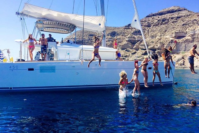 Santorini Catamaran Cruise with Fresh Meal and Open Bar - The onboard meal and drinks: fresh-cooked comfort with a view