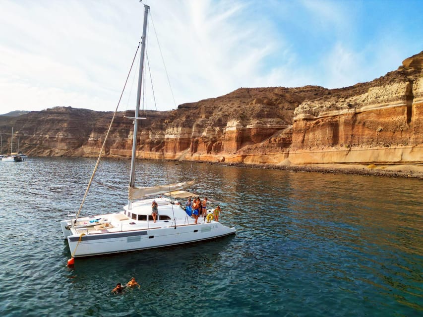 Santorini: Catamaran Cruise with Greek BBQ and Drinks - The Red Beach swim and snorkel stop (and why 30 minutes is perfect)