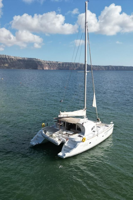 Santorini: Catamaran Cruise with Greek BBQ and Drinks - Nea Kameni and the volcanic hot springs soak you’ll remember
