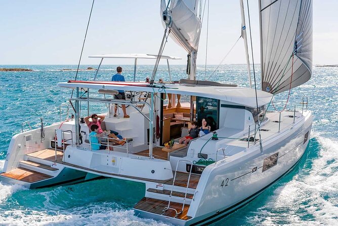 Santorini Catamaran Cruise with Greek Meal, Open-Bar and Sunset - From Your Hotel to the Jetty: The Logistics That Make or Break the Day